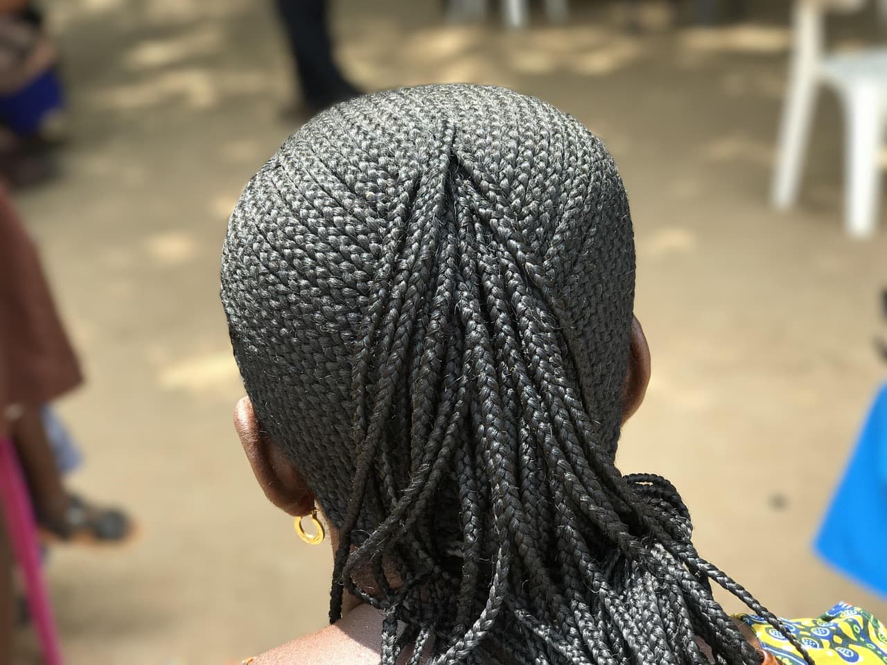 The back of a head of neat cornrows